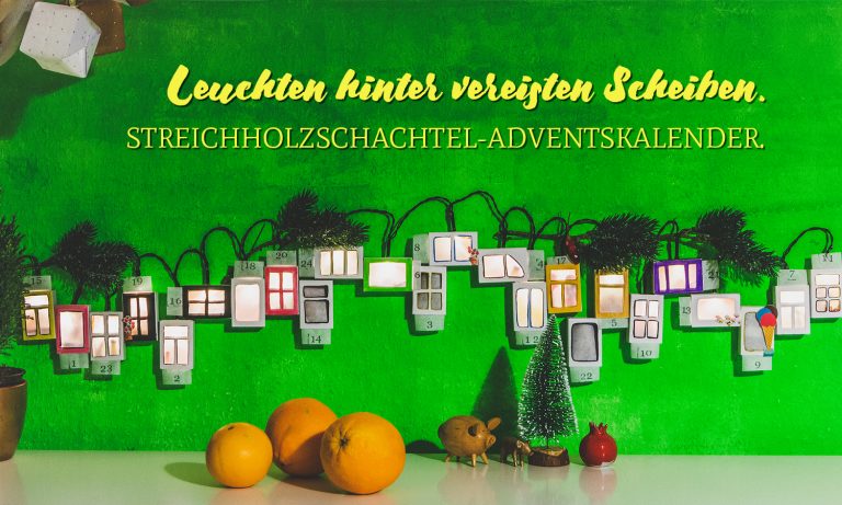 Titelbild: Leuchten hinter vereisten Scheiben. Streichholzschachtel-Adventskalender.
